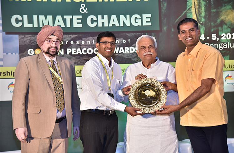 R Vinaya Kumar, VP, Toyota Kirloskar Motor, seen receiving the Golden Peacock Award for Energy Efficiency for 2019 from R V Deshpande, Minister for Revenue & Skill Development, Government of Karnataka