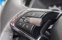 High-quality knurled scrollers on the steering wheel a clever convenience touch.