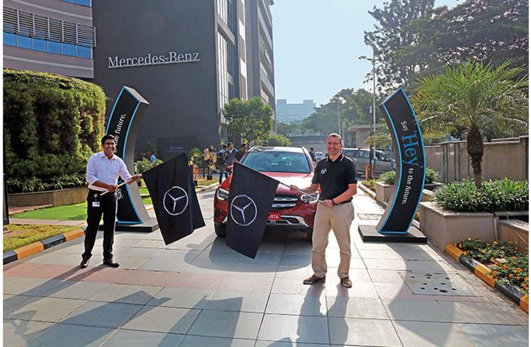 Martin Schwenk, MD and CEO, Mercedes- Benz India and Manu Saale flagging off a GLC media drive event last December.