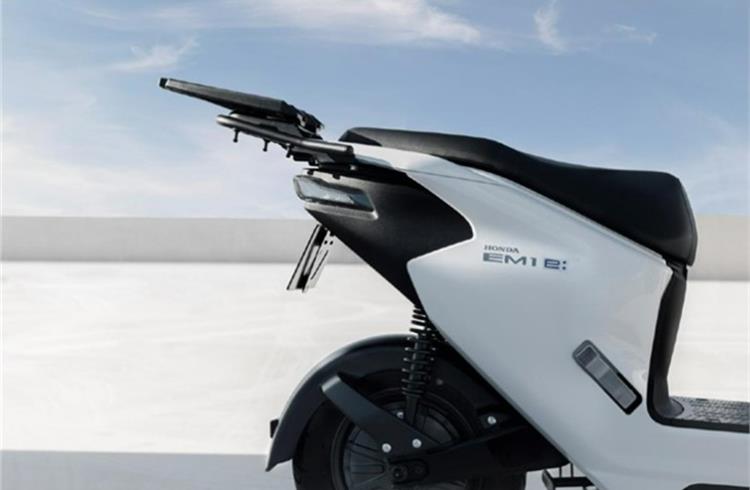 The electric scooter gets a large luggage rack at the rear, a 12-inch front wheel, a front disc brake and a telescopic front fork.