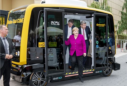Angela Merkel travels in a robo taxi at IAA 2019