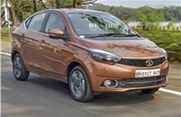 The Tata Tigor is the sub-four-metre, compact-sedan version of the Tiago and rivals the Maruti Suzuki Dzire, and Hyundai Aura. The car was launched in 2017 to offer consumers the choice of extra boot capacity in a relatively small vehicle footprint.
