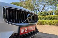 Chunky chrome-surrounded grille with massive Volvo emblem looks bold.