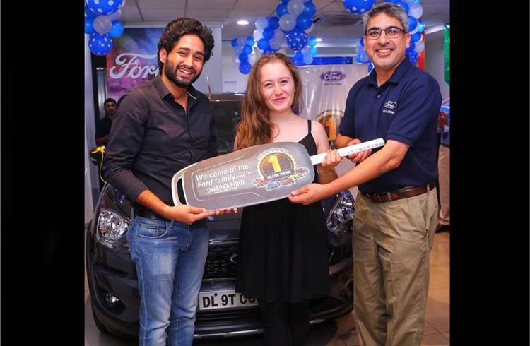 Anurag Mehrotra, MD and President, Ford India handing over Ford Freestyle to the one millionth customer.