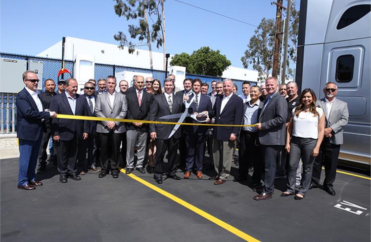 Penske celebrating the announcement of its new electric vehicle commercial charging capabilities at its La Mirada, CA, facility during a livestream ribbon-cutting event with the Advanced Clean Transpo
