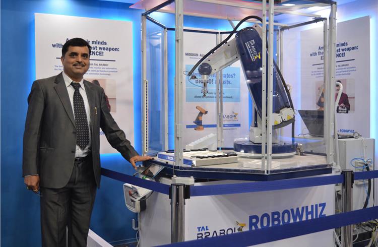 TAL Mfg’s Amit Bhingurde with the Brabo Robowhiz Educart which does palletising and path tracing, pick-and-place and path-tracing, pick-and-place with colour sensor application, and gesture and speech