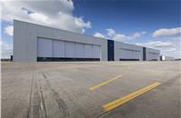 Three huge hangars are being converted to house production lines
