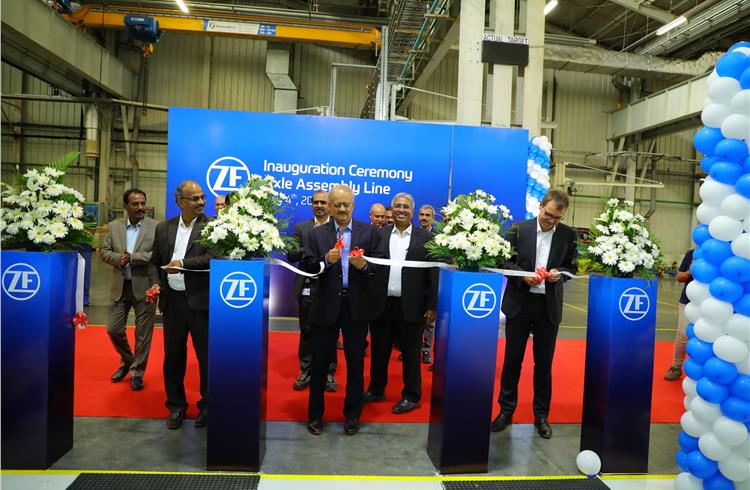 L-R: Ribbon cutting ceremony with Suresh KV, head of ZF Region India ; Vipin Sondhi, MD and CEO, JCB India and Tilo Huber, head of ZF business unit Construction Equipment.