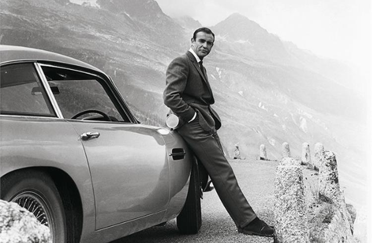 Sir Sean Connery with the iconic Aston Martin DB5 in the 1964 James Bond film, Goldfinger.