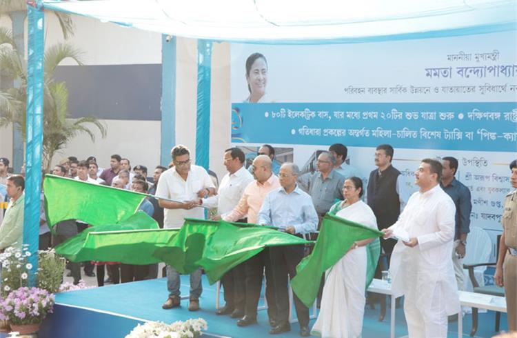 Chief minister Mamta Banerjee flags off Tata Motors' first electric bus in Kolkata.