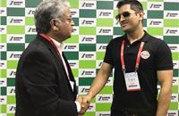 Cricketer M S Dhoni at the Schwing Stetter stall. Seen here with V G Sakthikumar, Managing Director, Schwing Stetter India.