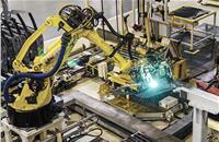 The assembly of the body via spot welding is done entirely by robots.