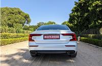 C-shaped LED tail lamps and sharply-raked rear windscreen add to the athletic pose.
