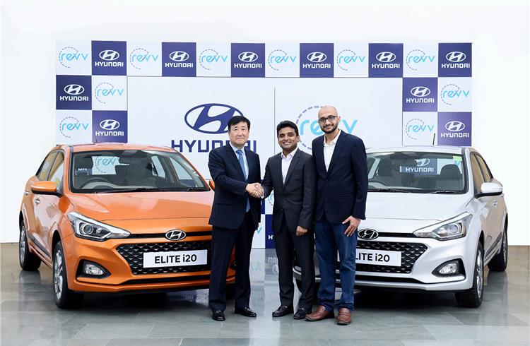 L-R: Young Key Koo, MD and CEO of Hyundai Motor India, along with Anupam Agarwal and Karan Jain, co-founders of Revv.