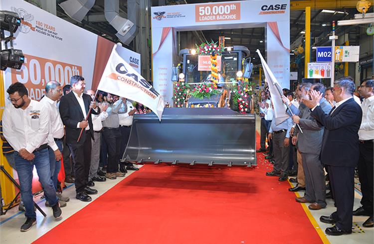 Satendra Tiwari, Plant Head - CASE Construction, India and Vaibhav Patel of Ranjit Buildcon, at the 50,000th loader backhoe rollout in the Pithampur plant. 