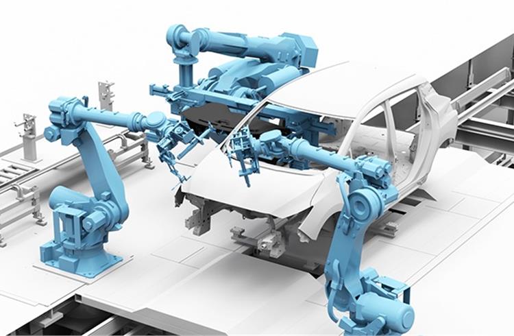 Nissan’s new system uses an automated pallet to mount the entire powertrain at once.