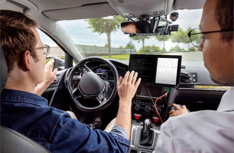 Bosch developers test automated driving in a development vehicle.