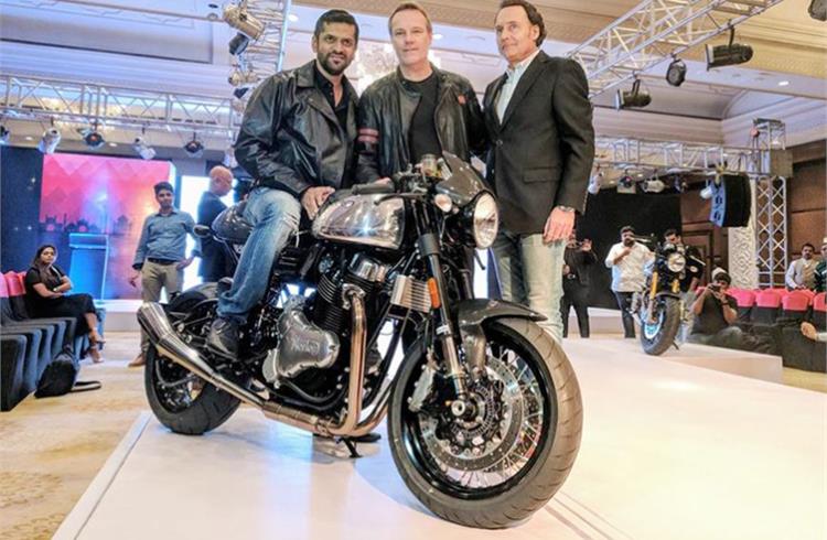 File photo (L-R): Ajinkya Firodia of Motoroyale; Stuart Garner, CEO of Norton Motorcycles; and Andreas Luthe, Development Head, Norton Motorcycles in New Delhi in November 2017.