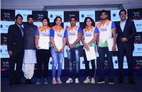 RT Wasan, Brijbhushan Sharan Singh and Girish Wagh handing over the contracts to the Indian wrestlers at the announcement of Tata Motors Elite Wrestlers Development Program