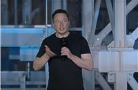 Elon Musk presented on stage at Investor Day 2023.