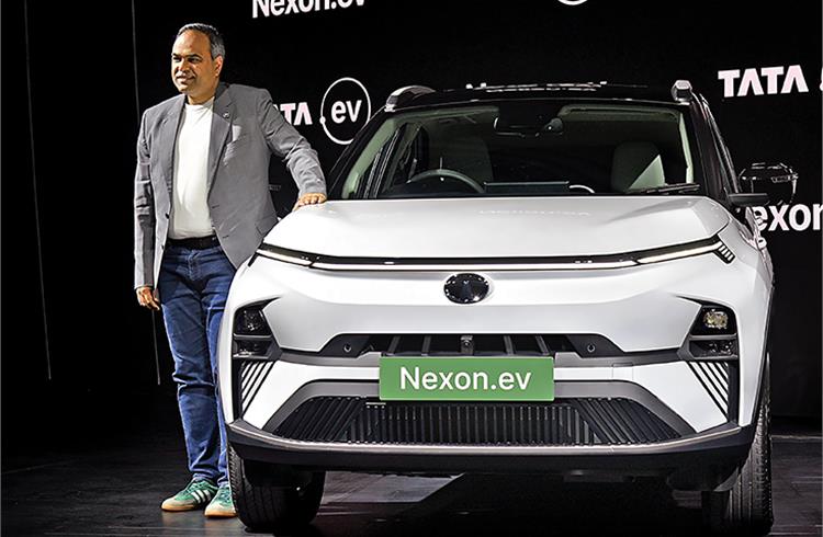 Shailesh Chandra, Managing Director of Tata Passenger Electric Mobility with the facelifted Nexon.ev during its launch in New Delhi in September 2023.