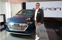 Rahil Ansari, Head - Audi India, with the India-bound all-electric Audi e-tron SUV. 