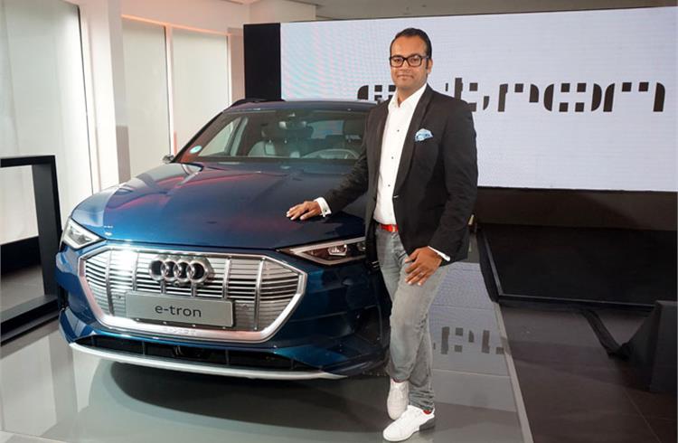 Rahil Ansari, Head - Audi India, with the India-bound all-electric Audi e-tron SUV. 