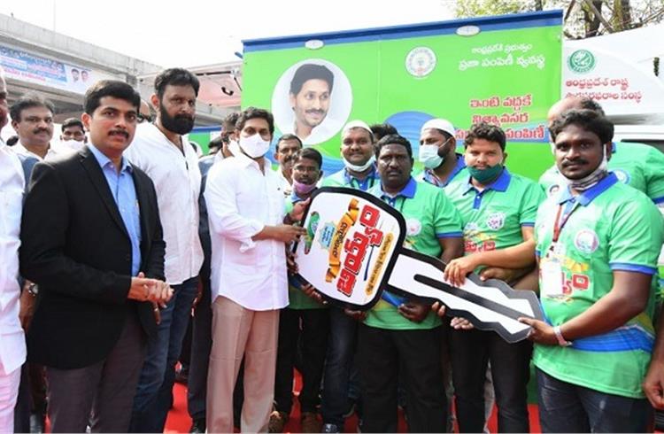 YS Jagan Mohan Reddy, chief minister, Andhra Pradesh handing over the keys to the mobile vans to beneficiaries under the Employment Guarantee Scheme.