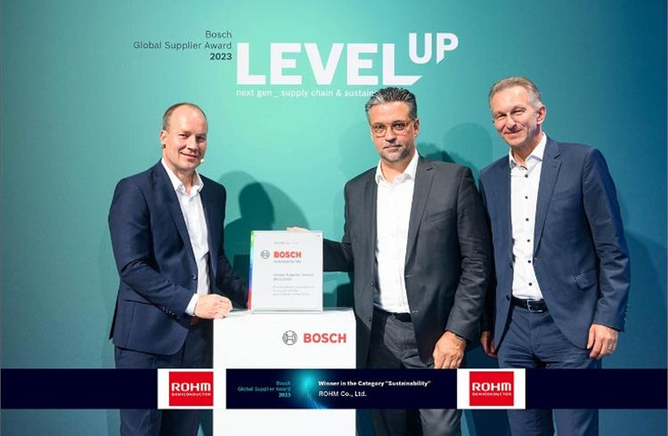 Dr. Arne Flemming (left), SVP, Corporate Supply Chain Management and Global Logistics Services at Bosch and Lutz Berg (right), EVP and Head of the Mobility Solutions Purchasing Direct Materials at Bosch, present the Bosch Global Supplier Award 2023 to Wolfram Harnack, President at ROHM Semiconductor Europe.