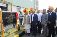 Minister of Agriculture and Rural Welfare, Narendra Singh Tomar and Hemant Sikka, President, Farm Equipment Sector, M&M, inaugurate the farm machinery plant in Pithampur. (Image: N S Tomar/Twitter)