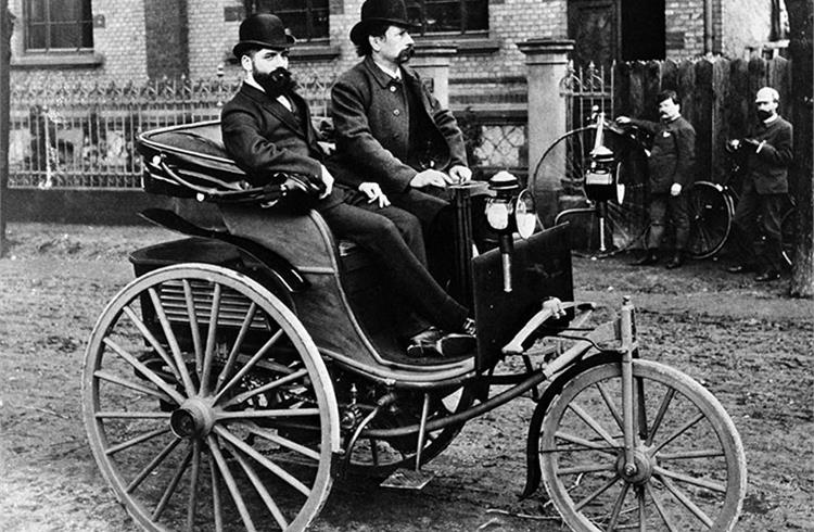 An outing with the 'Benz Patent Motor Car', the first automobile of the world. Carl Benz (2 November 1844 to 4 April 1929) is on the right-hand side; next to him is Josef Brecht, one of his employees.