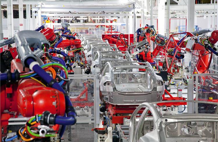 Tesla production continues to grow, funds permitting