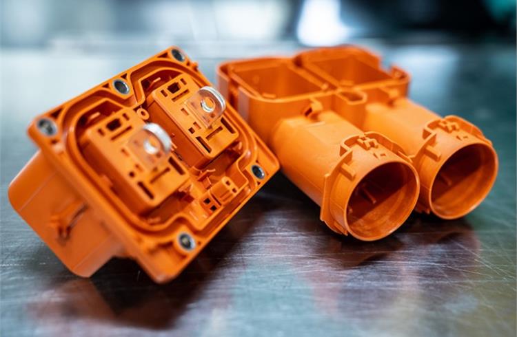 The colour orange is used in electric vehicles to identify live components. LANXESS offers a wide range of orange-colored, color-stable polyamide and polybutylene terephthalate compounds for such high-voltage applications.
