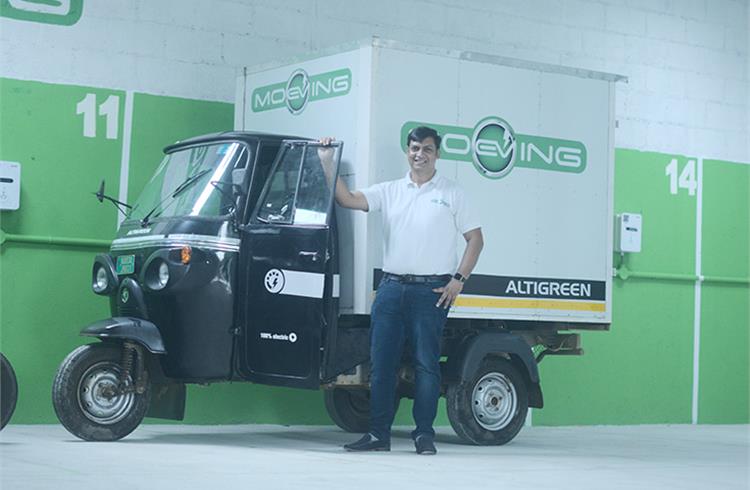 Vikash Mishra, founder and CEO, MoEVing with an Altigreen electric three-wheeler