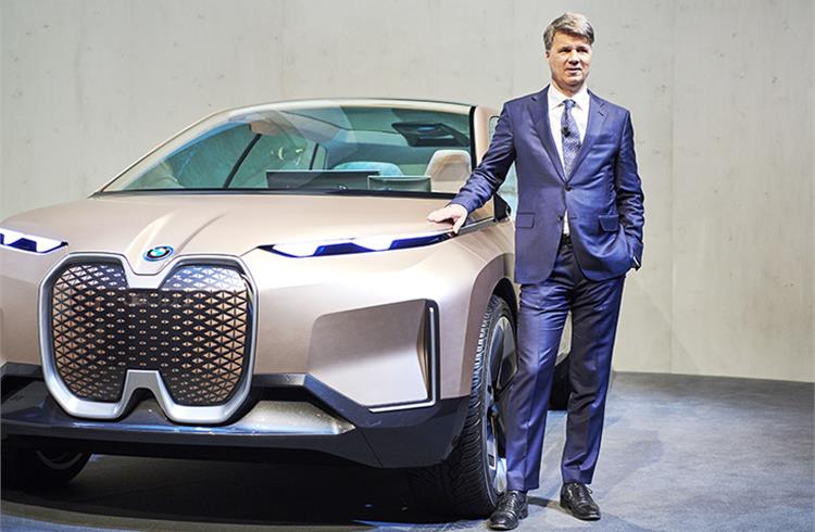 BMW boss Harald Krüger with the iNext concept.