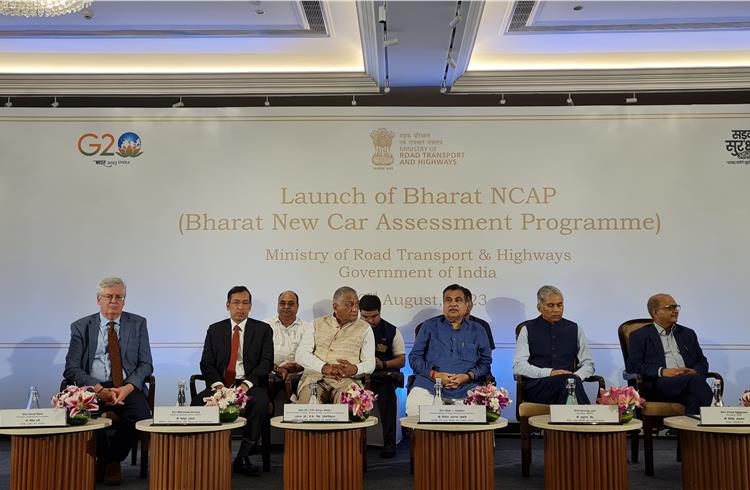 Union Minister for Road Transport and Highways, Nitin Gadkari, accompanied by government representatives and industry stakeholders at the launch of the Bharat NCAP regime in New Delhi 