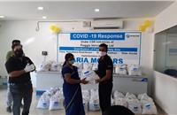 Piaggio donates over 11,000 ration kits to auto driver families in India