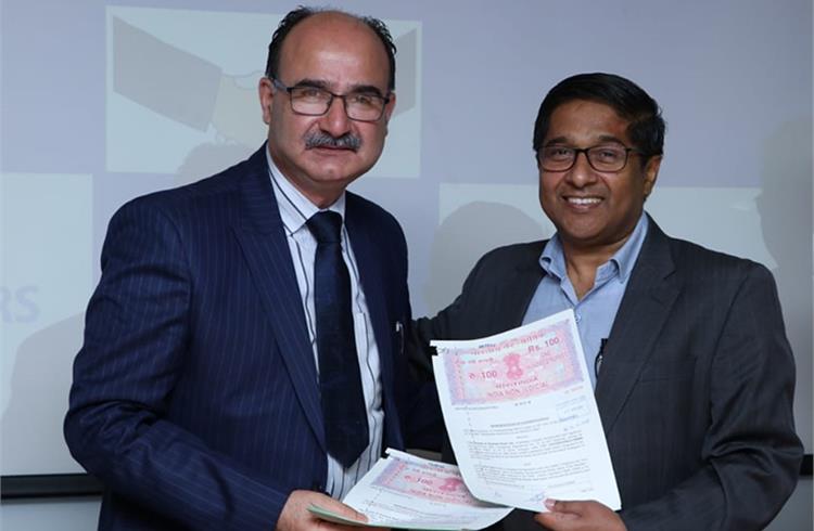 L-R: Syed Shafat Hussain Rufai, vice president, J&K Bank and R T Wasan, vice president, marketing and sales, CVBU, Tata Motors during the MOU signing