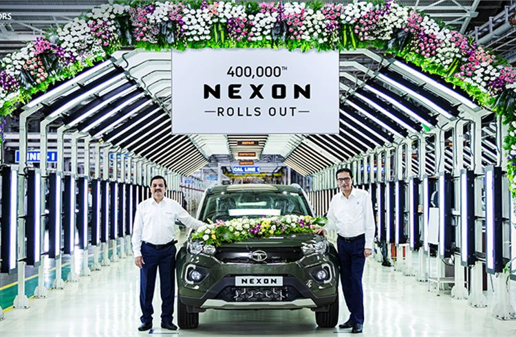 L-R:  Mohan Savarkar, VP, Product Line, Tata Motors Passenger Vehicles and Rajesh Khatri, VP, Operations, Tata Motors Passenger Vehicles with the 400,000th Nexon.