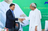 Sajjan Jindal, chairman of the JSW Group, and Naveen Patnaik, chief minister of Odisha.