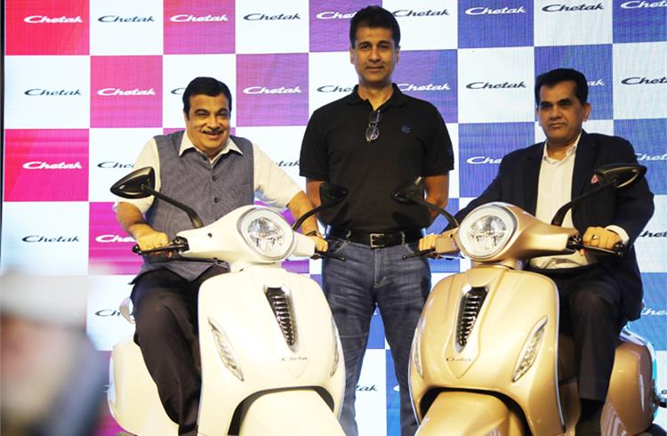 Nitin Gadkari, Minister of Road Transport and Highways; Rajiv Bajaj, MD, Bajaj Auto and Amitabh Kant, CEO, NITI Aayog unveil the Chetak electric scooter.