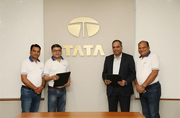 Prakriti E-Mobility co-founders Rajeev Tiwari, Nimish Trivedi and Vikas Bansal along with Shailesh Chandra, MD, Tata Motors PV and Tata Passenger Electric Mobility.