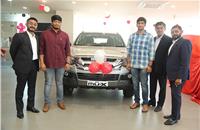 mu-X Vehicle Delivery at the inauguration of new service facility of Mahavir ISUZU in Vizag