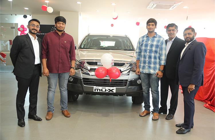 mu-X Vehicle Delivery at the inauguration of new service facility of Mahavir ISUZU in Vizag