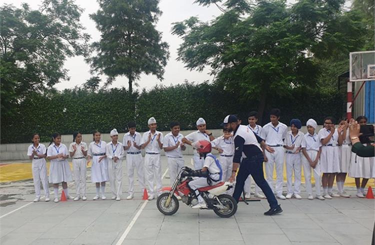 A student learns safe riding techniques on HMSI's imported CRF50 motorcycle.