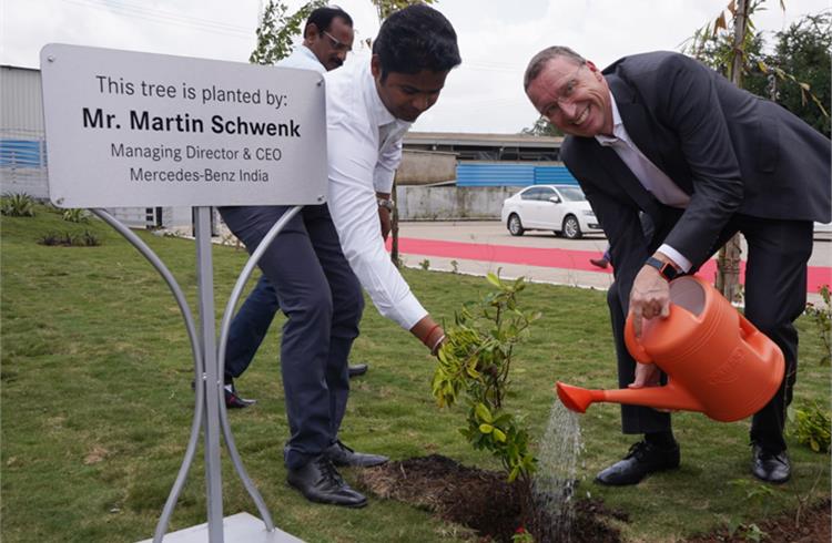 Martin Schwenk plants a sapling at the new facility, which is Mercedes-Benz’ 15th service facility in Maharashtra and the 32nd outlet in West India.  