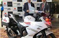 Koichiro Hirao, MD, Suzuki Motorcycle India handing over Suzuki Gixxer SF 250 to IPS Mohammed Akil, commissioner of Police, Gurgaon.