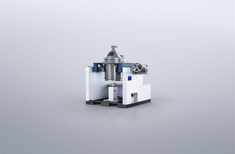 Trumpf’s new depowdering station turns the printed part upside down and starts to vibrate until virtually all the excess powder has been removed.