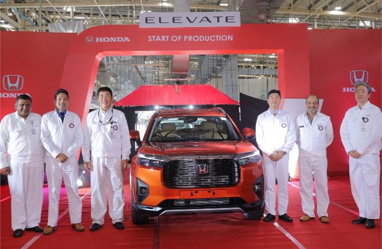 Takuya Tsumura, President and CEO Honda Cars India with HCIL members during the Start of Production ceremony of Honda Elevate at Tapukara manufacturing plant in Rajasthan.