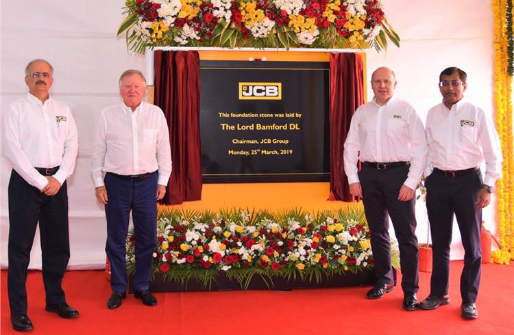 L-R: Vipin Sondhi, MD and CEO, JCB India; Lord Bamford, chairman JCB Group; Mark Turner, COO, JCB Group and Subir Chowdhury, COO, JCB India.